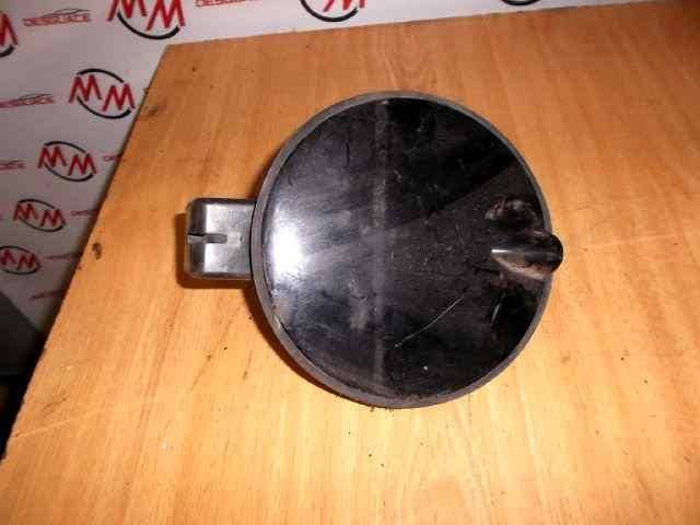 TAPA EXTERIOR COMBUSTIBLE
