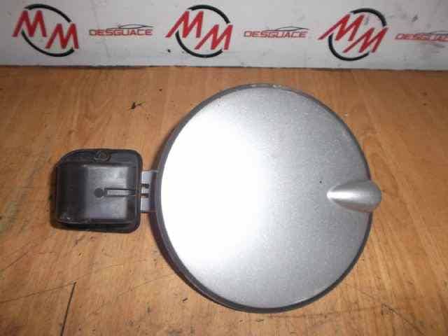 TAPA EXTERIOR COMBUSTIBLE