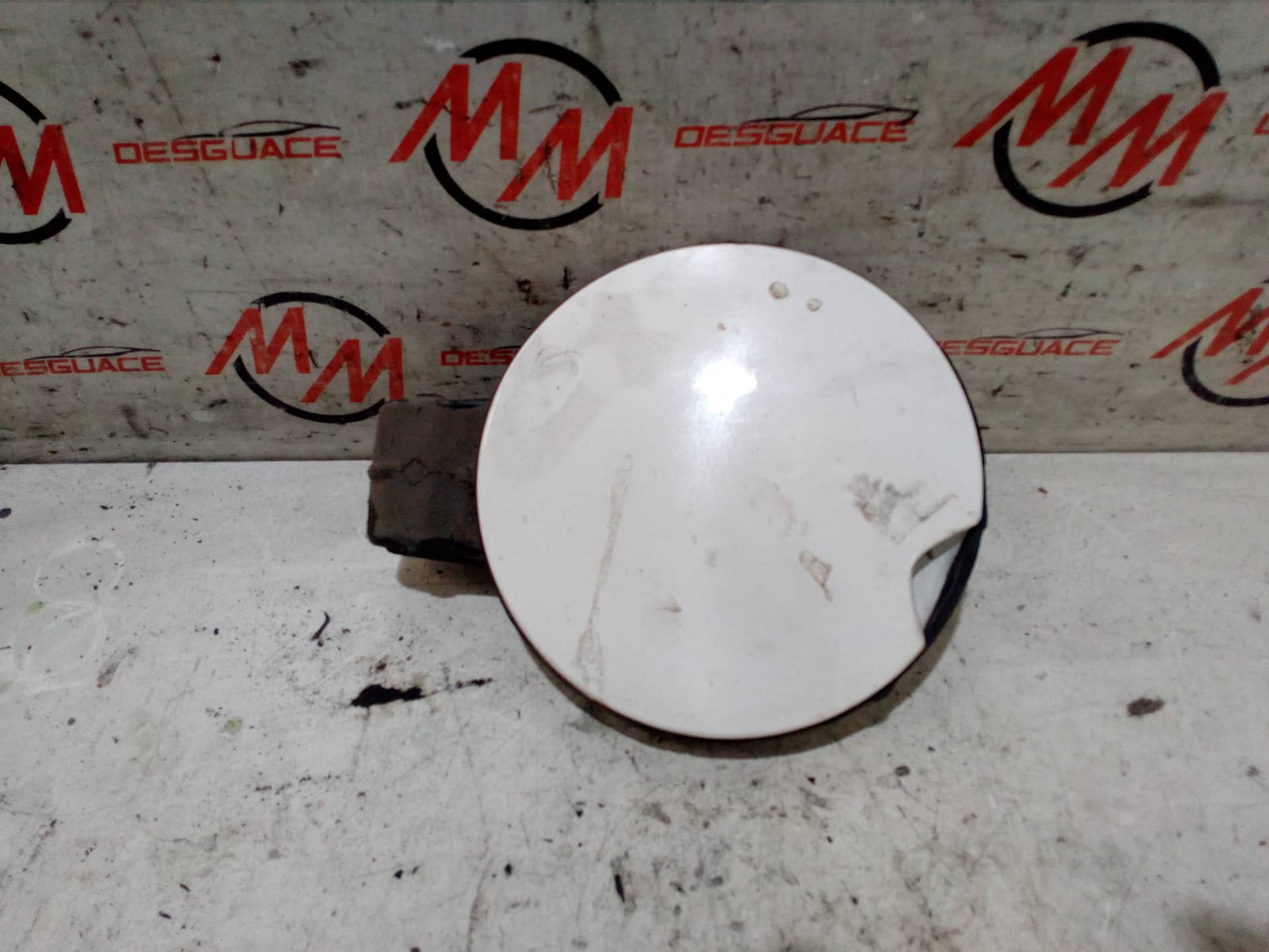 TAPA EXTERIOR COMBUSTIBLE