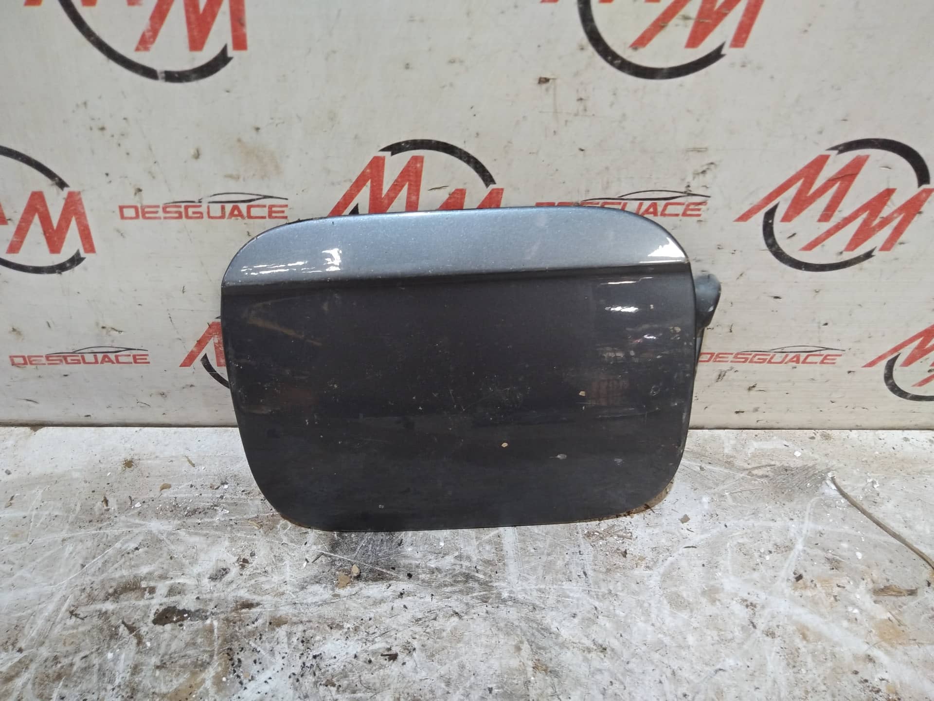 TAPA EXTERIOR COMBUSTIBLE